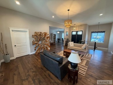 Spiral piers are the focal point of the double door grand entry on Teton Lakes Golf Courses in Idaho - for sale on GolfHomes.com, golf home, golf lot