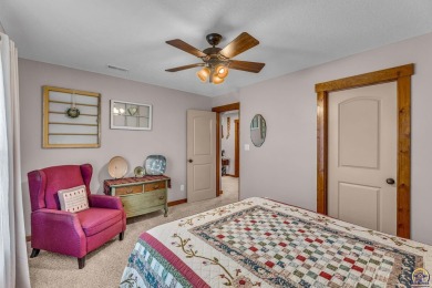 More than a townhome!... A smart, low-maintenance lifestyle near on Lake Shawnee Golf Course in Kansas - for sale on GolfHomes.com, golf home, golf lot