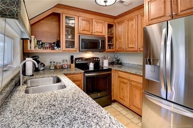 Welcome to 135 Pelham's Ordinary, a beautiful condo nestled on Kingsmill Resort and Golf Club in Virginia - for sale on GolfHomes.com, golf home, golf lot