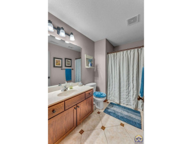 More than a townhome!... A smart, low-maintenance lifestyle near on Lake Shawnee Golf Course in Kansas - for sale on GolfHomes.com, golf home, golf lot