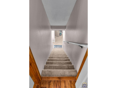 More than a townhome!... A smart, low-maintenance lifestyle near on Lake Shawnee Golf Course in Kansas - for sale on GolfHomes.com, golf home, golf lot