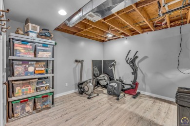 More than a townhome!... A smart, low-maintenance lifestyle near on Lake Shawnee Golf Course in Kansas - for sale on GolfHomes.com, golf home, golf lot