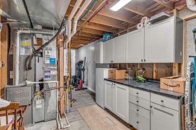 More than a townhome!... A smart, low-maintenance lifestyle near on Lake Shawnee Golf Course in Kansas - for sale on GolfHomes.com, golf home, golf lot
