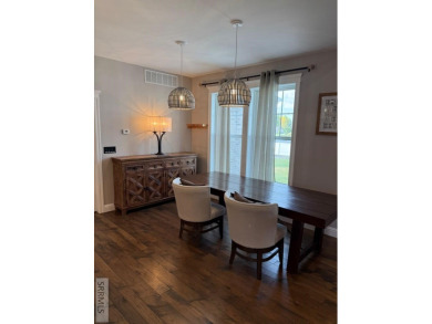 Spiral piers are the focal point of the double door grand entry on Teton Lakes Golf Courses in Idaho - for sale on GolfHomes.com, golf home, golf lot