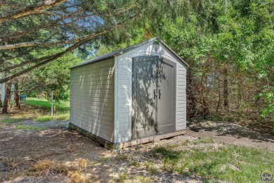 More than a townhome!... A smart, low-maintenance lifestyle near on Lake Shawnee Golf Course in Kansas - for sale on GolfHomes.com, golf home, golf lot