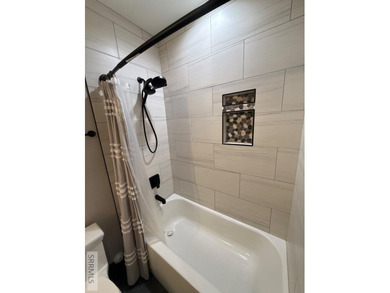 Spiral piers are the focal point of the double door grand entry on Teton Lakes Golf Courses in  - for sale on GolfHomes.com, golf home, golf lot