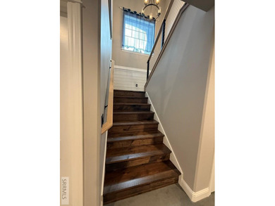 Spiral piers are the focal point of the double door grand entry on Teton Lakes Golf Courses in  - for sale on GolfHomes.com, golf home, golf lot