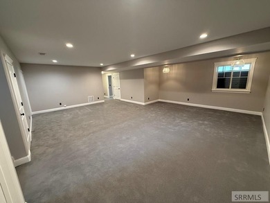 Spiral piers are the focal point of the double door grand entry on Teton Lakes Golf Courses in  - for sale on GolfHomes.com, golf home, golf lot