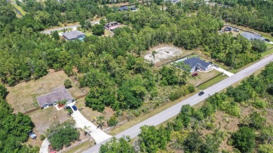 Build your dream home on this expansive 1.24-acre vacant lot on Wedgefield Golf Club in Florida - for sale on GolfHomes.com, golf home, golf lot