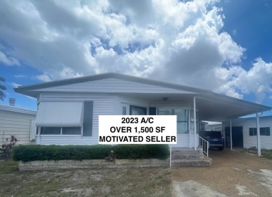 4530 9th St. #48 Bradenton, FL 34203  Twin Oaks 55+ Mobile Home on Heather Hills Golf Course in Florida - for sale on GolfHomes.com, golf home, golf lot