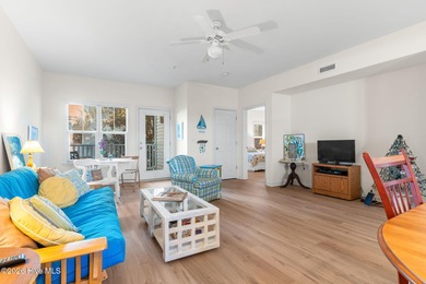 Experience easy coastal living in this fully furnished 2-bedroom on South Harbour Golf Links in North Carolina - for sale on GolfHomes.com, golf home, golf lot