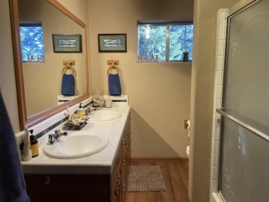 This wonderfully updated 3-bedroom, 2-bathroom home is nestled on Lake Almanor Country Club in California - for sale on GolfHomes.com, golf home, golf lot