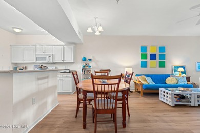 Experience easy coastal living in this fully furnished 2-bedroom on South Harbour Golf Links in North Carolina - for sale on GolfHomes.com, golf home, golf lot