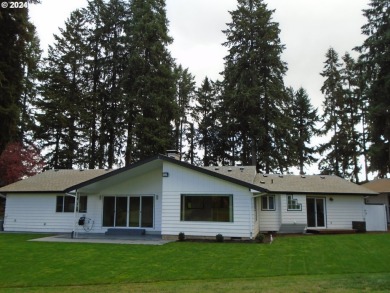 Mid-century modern ranch style home located on the 14th hole of on Club Green Meadows in Washington - for sale on GolfHomes.com, golf home, golf lot