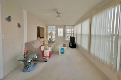 Welcome to this meticulously maintained double-wide home on Fairway Village Golf Course in Florida - for sale on GolfHomes.com, golf home, golf lot