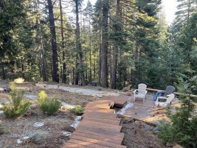 This wonderfully updated 3-bedroom, 2-bathroom home is nestled on Lake Almanor Country Club in California - for sale on GolfHomes.com, golf home, golf lot