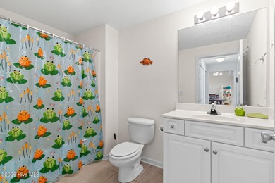 Experience easy coastal living in this fully furnished 2-bedroom on South Harbour Golf Links in North Carolina - for sale on GolfHomes.com, golf home, golf lot