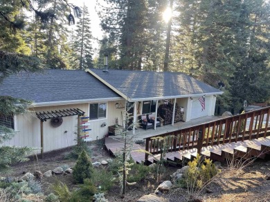 This wonderfully updated 3-bedroom, 2-bathroom home is nestled on Lake Almanor Country Club in California - for sale on GolfHomes.com, golf home, golf lot