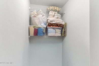 Experience easy coastal living in this fully furnished 2-bedroom on South Harbour Golf Links in North Carolina - for sale on GolfHomes.com, golf home, golf lot