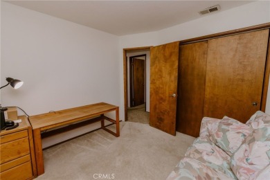 Enjoy the privilege of lake rights, granting you access to the on Lake Arrowhead Country Club in California - for sale on GolfHomes.com, golf home, golf lot