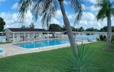 Welcome to this meticulously maintained double-wide home on Fairway Village Golf Course in Florida - for sale on GolfHomes.com, golf home, golf lot