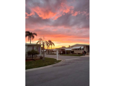 Welcome to this meticulously maintained double-wide home on Fairway Village Golf Course in Florida - for sale on GolfHomes.com, golf home, golf lot