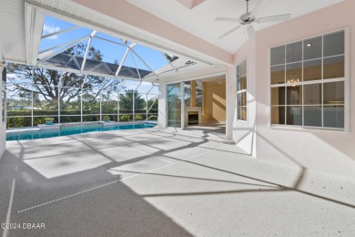 Beautiful pool home that sits on an oversized estate lot, with on Plantation Bay Golf and Country Club in Florida - for sale on GolfHomes.com, golf home, golf lot