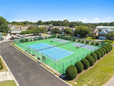 Experience easy coastal living in this fully furnished 2-bedroom on South Harbour Golf Links in North Carolina - for sale on GolfHomes.com, golf home, golf lot