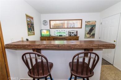 Enjoy the privilege of lake rights, granting you access to the on Lake Arrowhead Country Club in California - for sale on GolfHomes.com, golf home, golf lot