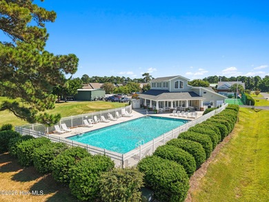 Experience easy coastal living in this fully furnished 2-bedroom on South Harbour Golf Links in North Carolina - for sale on GolfHomes.com, golf home, golf lot
