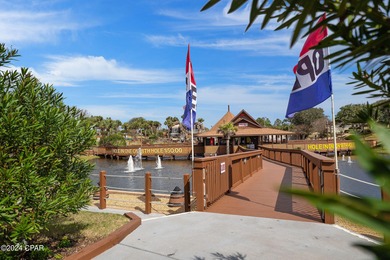 Discover Your Perfect Beachfront Escape! This stunning on Holiday Golf Club in Florida - for sale on GolfHomes.com, golf home, golf lot