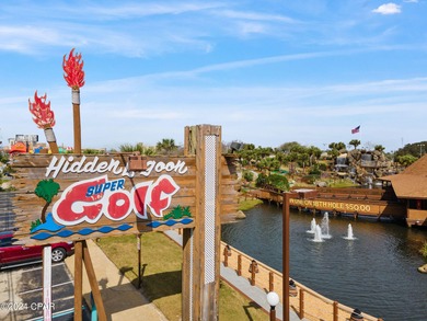 Discover Your Perfect Beachfront Escape! This stunning on Holiday Golf Club in Florida - for sale on GolfHomes.com, golf home, golf lot