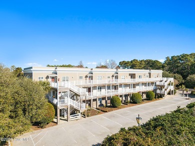 Experience easy coastal living in this fully furnished 2-bedroom on South Harbour Golf Links in North Carolina - for sale on GolfHomes.com, golf home, golf lot