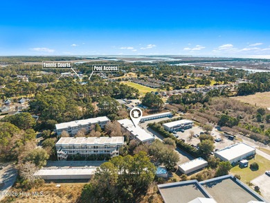 Experience easy coastal living in this fully furnished 2-bedroom on South Harbour Golf Links in North Carolina - for sale on GolfHomes.com, golf home, golf lot