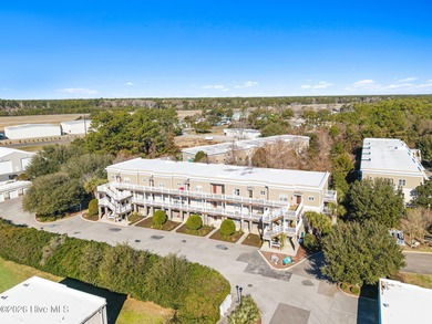 Experience easy coastal living in this fully furnished 2-bedroom on South Harbour Golf Links in North Carolina - for sale on GolfHomes.com, golf home, golf lot