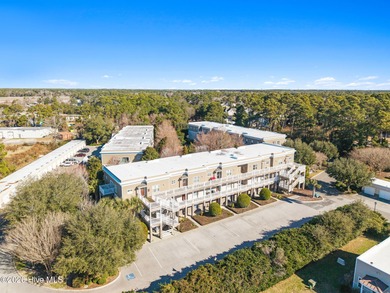 Experience easy coastal living in this fully furnished 2-bedroom on South Harbour Golf Links in North Carolina - for sale on GolfHomes.com, golf home, golf lot