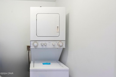 Discover Your Perfect Beachfront Escape! This stunning on Holiday Golf Club in Florida - for sale on GolfHomes.com, golf home, golf lot