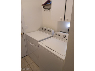 This charming condo located at 5877 Three Iron Drive in Naples on The Club At Strand in Florida - for sale on GolfHomes.com, golf home, golf lot