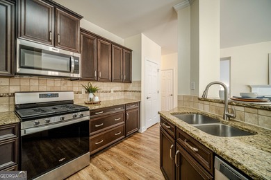 Spacious and elegant, this 4-bedroom, 2.5-bath home with 3,371 on Bear Creek Golf Club Inc in Georgia - for sale on GolfHomes.com, golf home, golf lot