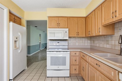 One or more photo(s) has been virtually staged. Welcome To 12906 on Beacon Woods Golf Club in Florida - for sale on GolfHomes.com, golf home, golf lot