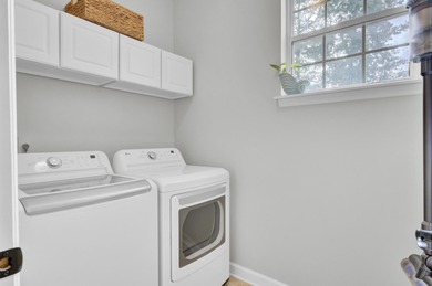 Located in the sought-after Whispering Marsh section of Dunes on Dunes West Golf Club in South Carolina - for sale on GolfHomes.com, golf home, golf lot