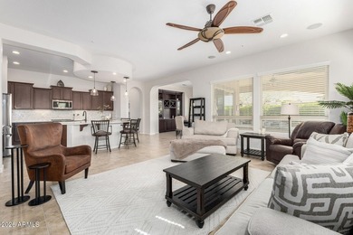 This beautifully maintained home features bright tile flooring on Trilogy Golf Club At Vistancia in Arizona - for sale on GolfHomes.com, golf home, golf lot