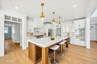 Contemporary and luxurious first floor living!! This 2730 sq ft on Quashnet Valley Country Club in Massachusetts - for sale on GolfHomes.com, golf home, golf lot