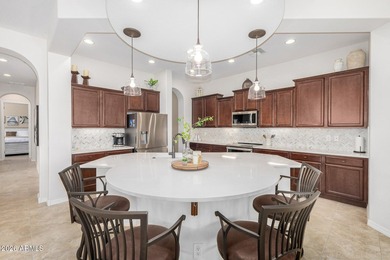 This beautifully maintained home features bright tile flooring on Trilogy Golf Club At Vistancia in Arizona - for sale on GolfHomes.com, golf home, golf lot