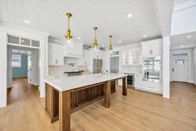 Contemporary and luxurious first floor living!! This 2730 sq ft on Quashnet Valley Country Club in Massachusetts - for sale on GolfHomes.com, golf home, golf lot