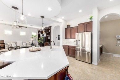 This beautifully maintained home features bright tile flooring on Trilogy Golf Club At Vistancia in Arizona - for sale on GolfHomes.com, golf home, golf lot