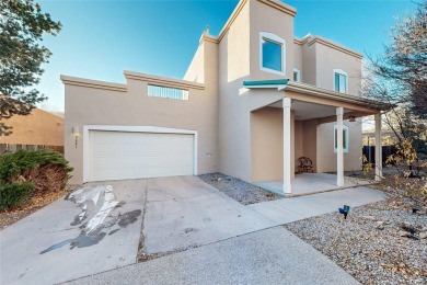 Nestled in a peaceful cul-de-sac off Camino Rojo, this elegant on Santa Fe Country Club in New Mexico - for sale on GolfHomes.com, golf home, golf lot