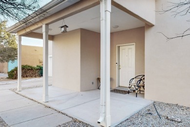 Nestled in a peaceful cul-de-sac off Camino Rojo, this elegant on Santa Fe Country Club in New Mexico - for sale on GolfHomes.com, golf home, golf lot