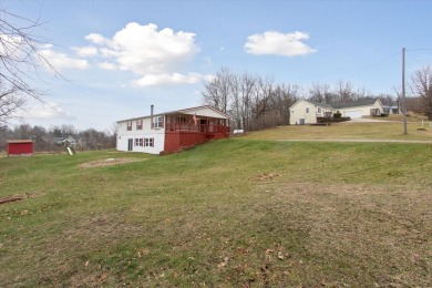 Welcome to 10291 Highland Green Drive, a 3-bedroom, 3-bath home on Lake LeAnn Golf Course in Michigan - for sale on GolfHomes.com, golf home, golf lot