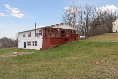 Welcome to 10291 Highland Green Drive, a 3-bedroom, 3-bath home on Lake LeAnn Golf Course in Michigan - for sale on GolfHomes.com, golf home, golf lot